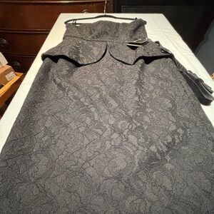 Black belted jacquard dress can be worn strapless or with straps